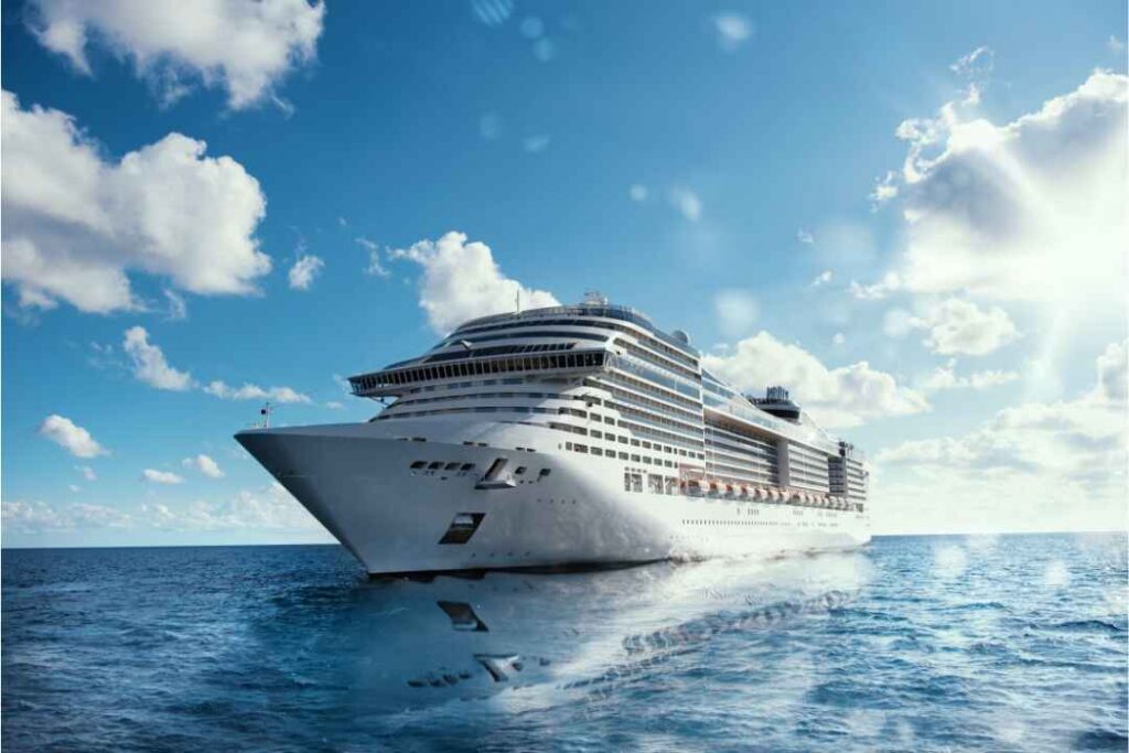 Luxury cruise ship sailing on the ocean under a bright sky – Westgate Cruise and Travel 2025 vacation booking guide
