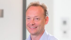 Jason Colodne smiling portrait representing insights from Jason Colodne 5 questions every investor must know