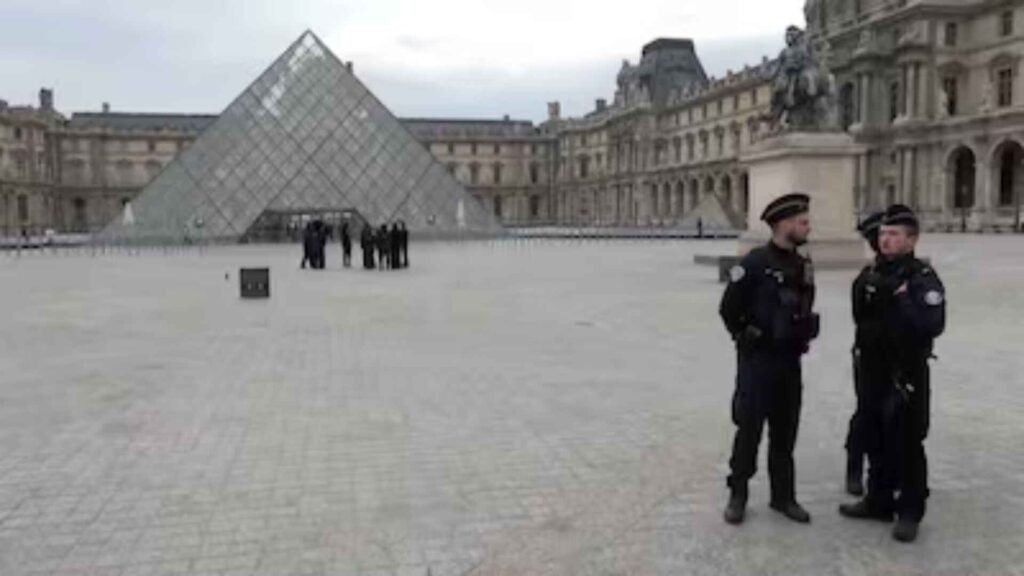 Police secure the louvre museum robbery courtyard in Paris after shocking louvre museum robber and jewel heist.