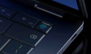 Googlebook keyboard closeup showing glowing Magic Pointer key with Gemini AI integration